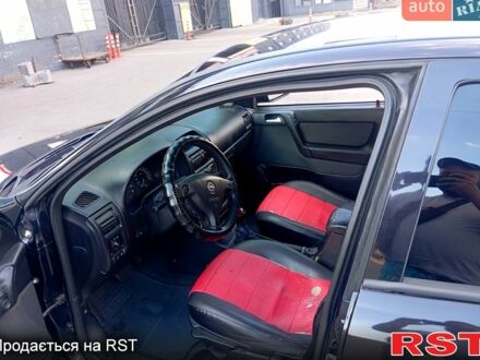 Черный Опель Астра, объемом двигателя 1.6 л и пробегом 315 тыс. км за 1500 $, фото 1 на Automoto.ua