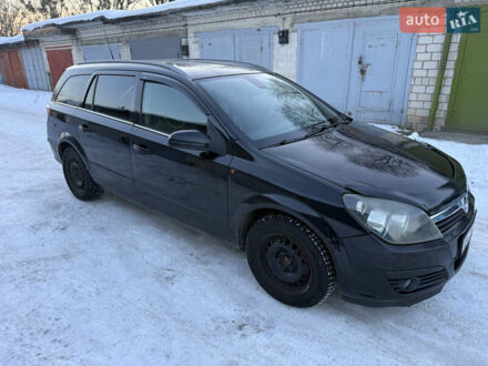 Черный Опель Астра, объемом двигателя 1.6 л и пробегом 442 тыс. км за 3299 $, фото 1 на Automoto.ua