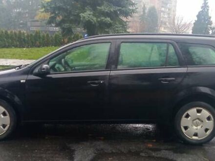 Черный Опель Астра, объемом двигателя 1.69 л и пробегом 387 тыс. км за 3500 $, фото 1 на Automoto.ua