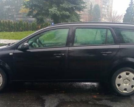 Черный Опель Астра, объемом двигателя 1.69 л и пробегом 387 тыс. км за 3500 $, фото 1 на Automoto.ua