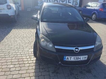Черный Опель Астра, объемом двигателя 1.4 л и пробегом 250 тыс. км за 4000 $, фото 1 на Automoto.ua