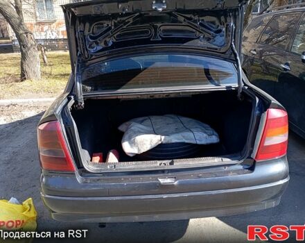 Черный Опель Астра, объемом двигателя 1.4 л и пробегом 292 тыс. км за 2700 $, фото 1 на Automoto.ua