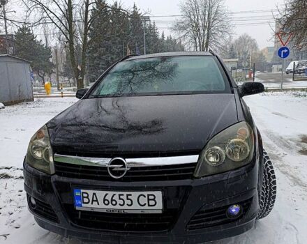 Черный Опель Астра, объемом двигателя 1.7 л и пробегом 350 тыс. км за 5000 $, фото 1 на Automoto.ua