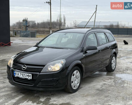 Черный Опель Астра, объемом двигателя 1.8 л и пробегом 185 тыс. км за 5000 $, фото 1 на Automoto.ua