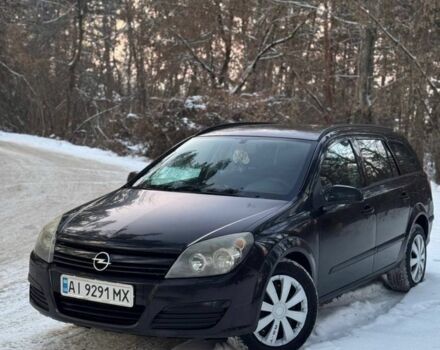Черный Опель Астра, объемом двигателя 1.9 л и пробегом 220 тыс. км за 4000 $, фото 1 на Automoto.ua