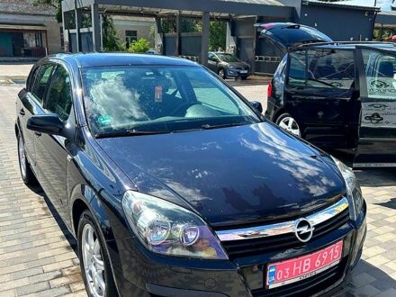 Черный Опель Астра, объемом двигателя 1.6 л и пробегом 212 тыс. км за 4600 $, фото 1 на Automoto.ua