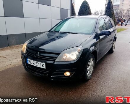 Черный Опель Астра, объемом двигателя 1.7 л и пробегом 320 тыс. км за 3250 $, фото 1 на Automoto.ua