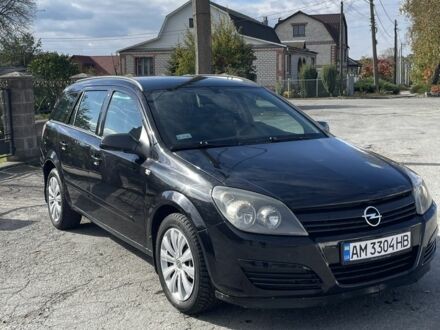 Черный Опель Астра, объемом двигателя 1.7 л и пробегом 320 тыс. км за 4250 $, фото 1 на Automoto.ua
