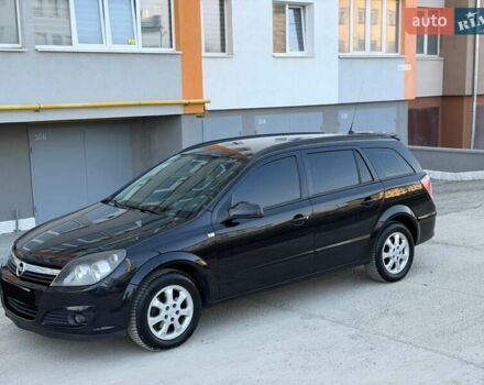 Черный Опель Астра, объемом двигателя 1.6 л и пробегом 260 тыс. км за 3899 $, фото 1 на Automoto.ua