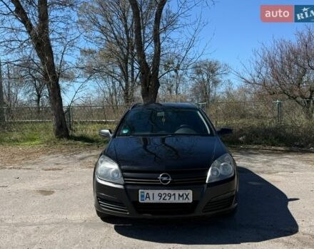Черный Опель Астра, объемом двигателя 1.9 л и пробегом 325 тыс. км за 4999 $, фото 1 на Automoto.ua