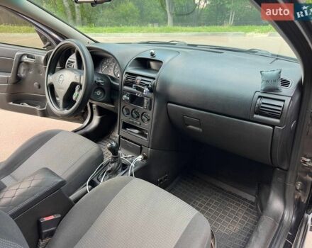 Черный Опель Астра, объемом двигателя 1.4 л и пробегом 146 тыс. км за 3500 $, фото 1 на Automoto.ua