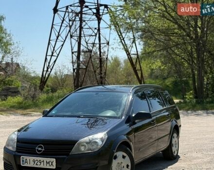 Черный Опель Астра, объемом двигателя 1.9 л и пробегом 325 тыс. км за 4700 $, фото 1 на Automoto.ua