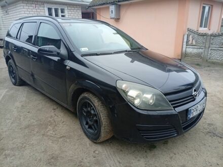 Черный Опель Астра, объемом двигателя 1 л и пробегом 276 тыс. км за 1900 $, фото 1 на Automoto.ua