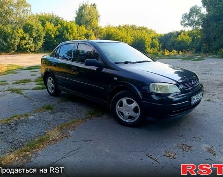 Черный Опель Астра, объемом двигателя 1.4 л и пробегом 249 тыс. км за 3100 $, фото 1 на Automoto.ua