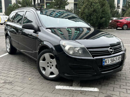 Черный Опель Астра, объемом двигателя 1.7 л и пробегом 330 тыс. км за 5200 $, фото 1 на Automoto.ua