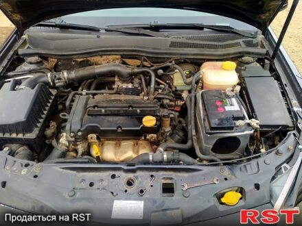 Черный Опель Астра, объемом двигателя 1.4 л и пробегом 200 тыс. км за 4500 $, фото 1 на Automoto.ua