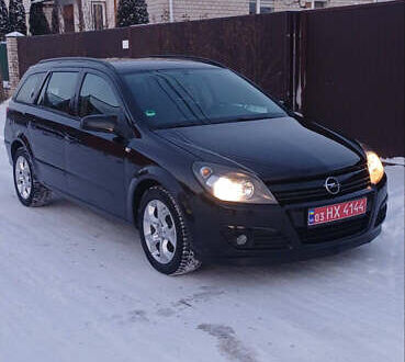 Черный Опель Астра, объемом двигателя 1.6 л и пробегом 226 тыс. км за 5300 $, фото 1 на Automoto.ua