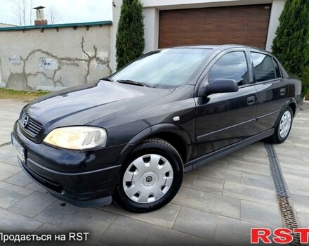 Черный Опель Астра, объемом двигателя 1.4 л и пробегом 110 тыс. км за 5450 $, фото 1 на Automoto.ua