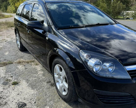 Черный Опель Астра, объемом двигателя 1.6 л и пробегом 248 тыс. км за 5200 $, фото 1 на Automoto.ua