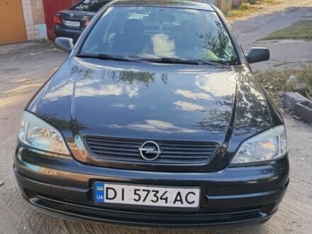 Черный Опель Астра, объемом двигателя 1.4 л и пробегом 136 тыс. км за 3900 $, фото 1 на Automoto.ua