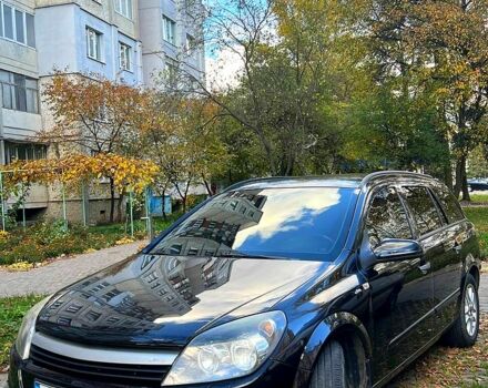 Черный Опель Астра, объемом двигателя 1.9 л и пробегом 230 тыс. км за 5400 $, фото 1 на Automoto.ua