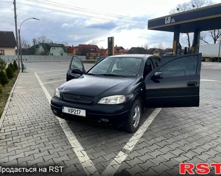 Черный Опель Астра, объемом двигателя 1.8 л и пробегом 320 тыс. км за 2890 $, фото 1 на Automoto.ua