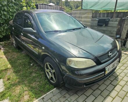 Черный Опель Астра, объемом двигателя 1.4 л и пробегом 250 тыс. км за 3300 $, фото 1 на Automoto.ua