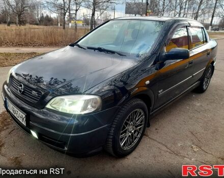 Черный Опель Астра, объемом двигателя 1.4 л и пробегом 199 тыс. км за 4600 $, фото 1 на Automoto.ua