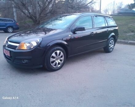 Черный Опель Астра, объемом двигателя 1 л и пробегом 154 тыс. км за 5250 $, фото 1 на Automoto.ua