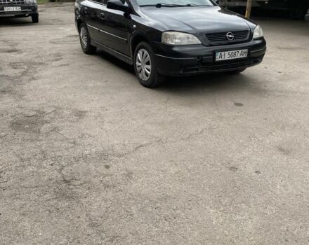 Черный Опель Астра, объемом двигателя 1.4 л и пробегом 240 тыс. км за 2900 $, фото 1 на Automoto.ua