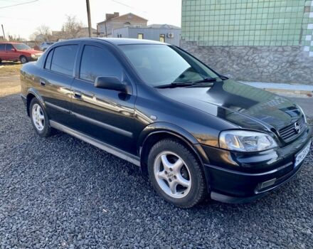 Черный Опель Астра, объемом двигателя 1.4 л и пробегом 196 тыс. км за 3600 $, фото 1 на Automoto.ua