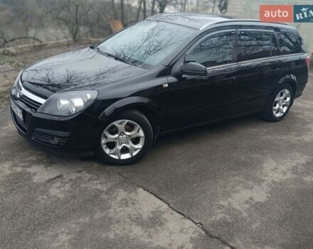 Черный Опель Астра, объемом двигателя 1.6 л и пробегом 258 тыс. км за 4999 $, фото 1 на Automoto.ua