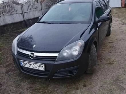 Черный Опель Астра, объемом двигателя 1.2 л и пробегом 340 тыс. км за 3200 $, фото 1 на Automoto.ua