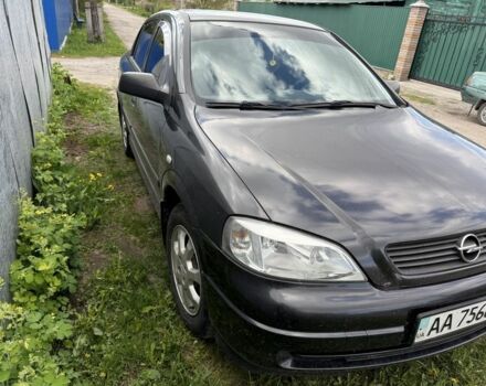 Черный Опель Астра, объемом двигателя 1.4 л и пробегом 202 тыс. км за 3500 $, фото 1 на Automoto.ua