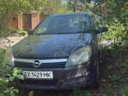 Черный Опель Астра, объемом двигателя 1.6 л и пробегом 245 тыс. км за 3800 $, фото 1 на Automoto.ua