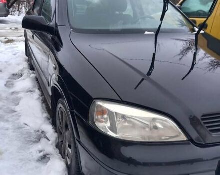 Черный Опель Астра, объемом двигателя 1.39 л и пробегом 235 тыс. км за 3200 $, фото 1 на Automoto.ua