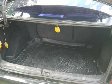 Черный Опель Астра, объемом двигателя 1.4 л и пробегом 243 тыс. км за 3200 $, фото 1 на Automoto.ua