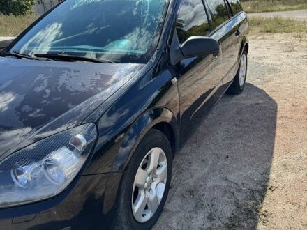 Черный Опель Астра, объемом двигателя 1.6 л и пробегом 248 тыс. км за 5200 $, фото 1 на Automoto.ua