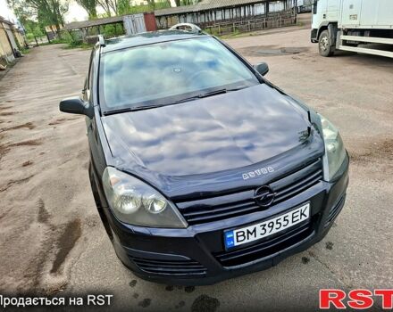 Черный Опель Астра, объемом двигателя 1.4 л и пробегом 318 тыс. км за 4000 $, фото 1 на Automoto.ua