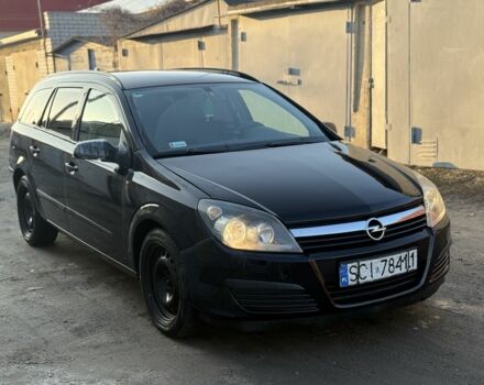 Черный Опель Астра, объемом двигателя 1.9 л и пробегом 300 тыс. км за 2000 $, фото 1 на Automoto.ua