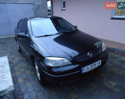 Черный Опель Астра, объемом двигателя 2 л и пробегом 300 тыс. км за 3500 $, фото 1 на Automoto.ua