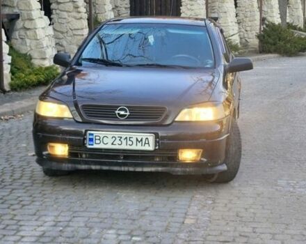 Черный Опель Астра, объемом двигателя 1.4 л и пробегом 251 тыс. км за 2900 $, фото 1 на Automoto.ua