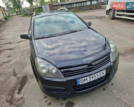 Черный Опель Астра, объемом двигателя 1.4 л и пробегом 318 тыс. км за 4000 $, фото 1 на Automoto.ua