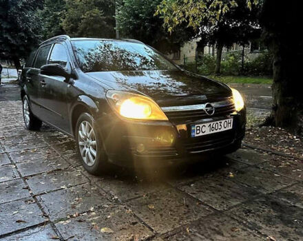 Черный Опель Астра, объемом двигателя 1.6 л и пробегом 235 тыс. км за 4900 $, фото 1 на Automoto.ua