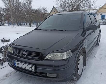 Черный Опель Астра, объемом двигателя 1.4 л и пробегом 250 тыс. км за 3600 $, фото 1 на Automoto.ua