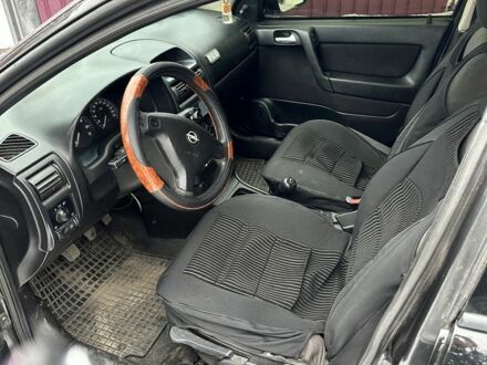 Черный Опель Астра, объемом двигателя 1.4 л и пробегом 208 тыс. км за 2849 $, фото 1 на Automoto.ua