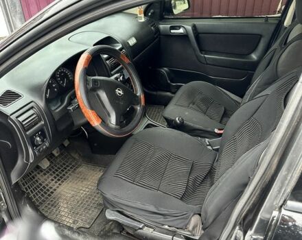 Черный Опель Астра, объемом двигателя 1.4 л и пробегом 208 тыс. км за 2849 $, фото 1 на Automoto.ua