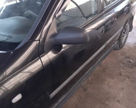 Черный Опель Астра, объемом двигателя 1.4 л и пробегом 280 тыс. км за 3000 $, фото 1 на Automoto.ua