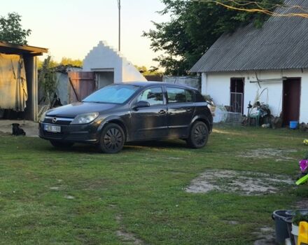 Черный Опель Астра, объемом двигателя 1 л и пробегом 296 тыс. км за 2200 $, фото 1 на Automoto.ua