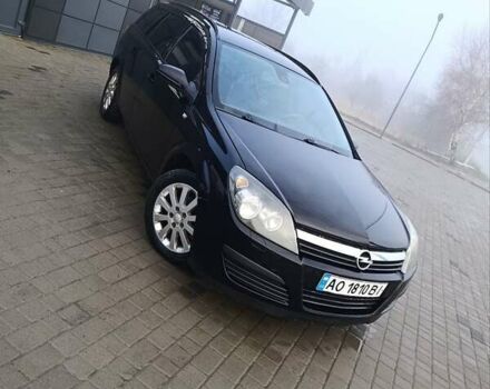 Черный Опель Астра, объемом двигателя 1.3 л и пробегом 247 тыс. км за 4300 $, фото 1 на Automoto.ua